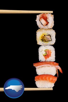 sushi with chopsticks - with North Carolina icon
